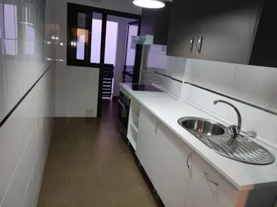 a kitchen with a sink and a counter top at Medina-Sidonia. Apartamento. Carrión y La Zaga in Medina Sidonia