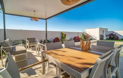 a dining room with a table and chairs at Gorgeous Home In Chiclana De La Fronter in Chiclana de la Frontera