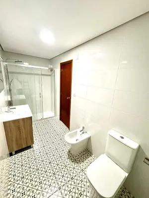 a bathroom with a toilet and a sink at pleno centro con garaje , san Jorge in Sanlúcar de Barrameda