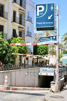 a street sign in front of a building at Apartment in Plaza Arenal in Jerez de la Frontera