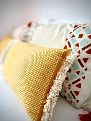 a close up of a pillow on a bed at MyChoice Pitiusa in Rota
