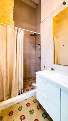a bathroom with a sink and a shower at Casa Plaza Candelaria Cádiz Grupo AC Gestión in Cádiz