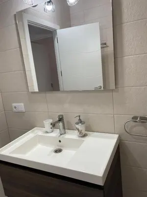 a bathroom with a white sink and a mirror at Casa Delia in Bornos