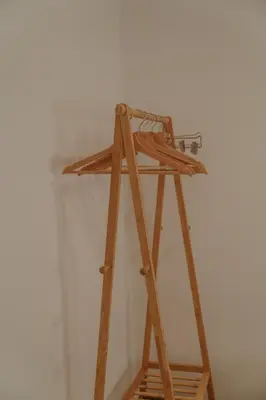 a wooden ladder leaning against a wall at Apartamento El Mazacote Sanlúcar de Barrameda in Sanlúcar de Barrameda