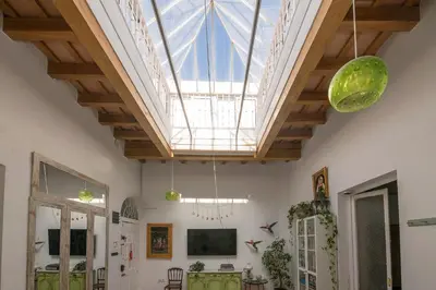 a skylight in a living room with a ceiling at Starlight in Cádiz