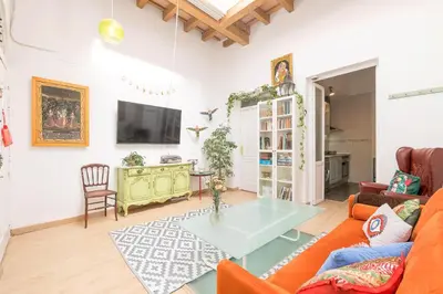 a living room with a couch and a table at Starlight in Cádiz