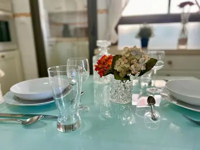 two beds sitting next to each other in a room at GATU Cream, terraza, parking, aire acc, piscina común 