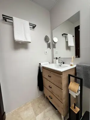 a bathroom with a sink and a mirror at CARPE DIEM in Jerez de la Frontera