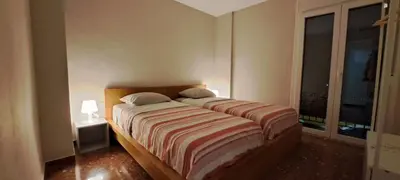 a bedroom with a bed and a window at Villa Marcel in Jerez de la Frontera