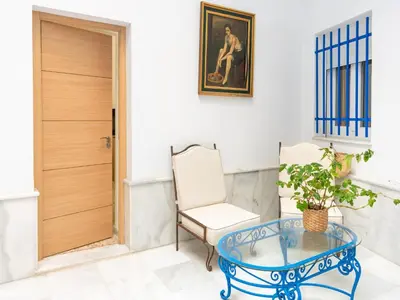 a room with a glass table and a chair at Holiday Home in Cadiz by the Sea in Cádiz