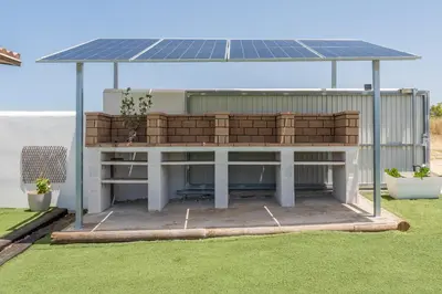a building with a roof with a solar panel on it at El Paraíso Perdido in Conil de la Frontera
