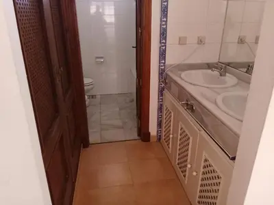 a bathroom with a sink and a toilet at Apartamentos Jasmund - Estudio 02 in San Fernando