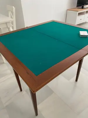 a pool table with a green top in a room at Jerez Avenida in Jerez de la Frontera