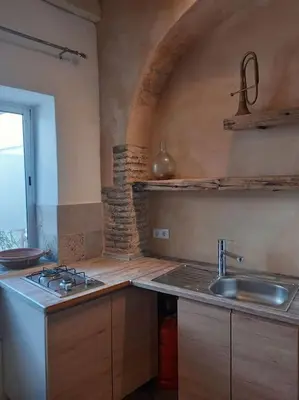 a kitchen with a sink and a counter top at Casa Florinda #5 in Jerez de la Frontera