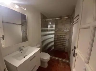 a bathroom with a sink and a toilet and a shower at Casa Florinda #5 in Jerez de la Frontera
