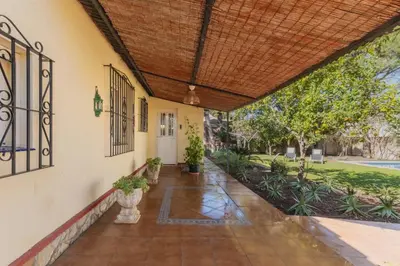 an empty hallway of a house with a wooden ceiling at Cadizz - Villa Verde- La Barrosa - ideal familias y grupos de amigos in Chiclana de la Frontera