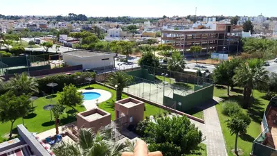 an aerial view of a city with a park at Apartamento JARDINES DE BAJO GUIA in Sanlúcar de Barrameda