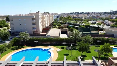 an aerial view of a resort with a swimming pool at Apartamento JARDINES DE BAJO GUIA in Sanlúcar de Barrameda