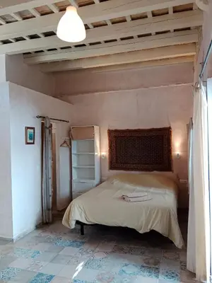 a bedroom with a bed in a room at Casa Florinda #4 in Jerez de la Frontera