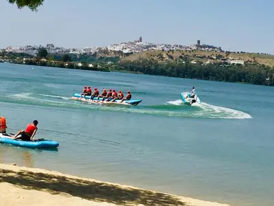 a group of people riding on boats in the water at Casa con vistas en Arcos in Arcos de la Frontera