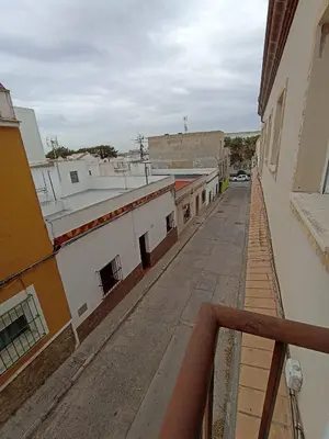 a view of an empty street from a building at Argentina in Chiclana de la Frontera