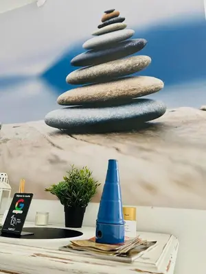 a blue cone on a table with a christmas tree at Sotavento Alpisteras in Sanlúcar de Barrameda