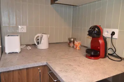 a kitchen counter with a mixer on a counter top at Apartamento Pie de Rey in Jerez de la Frontera