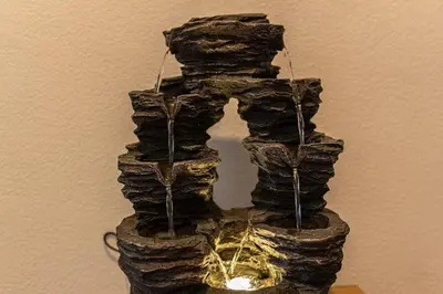 a sculpture of a stack of rocks with lights at CR Apartment Jerez in Jerez de la Frontera