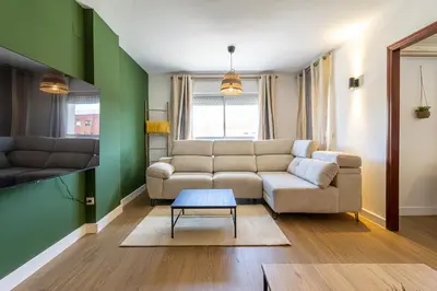 a living room with a couch and a table at CR Apartment Jerez in Jerez de la Frontera