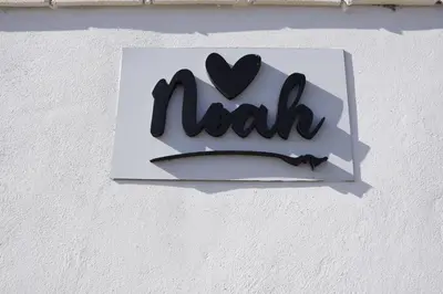 a sign on a wall with the word mail at Villas Noah in Chiclana de la Frontera
