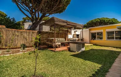 a backyard with a gazebo at Nice Home In Chiclana De La Fronter in Novo Sancti Petri