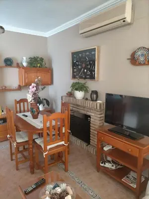 a hotel room with two beds in a room at Villa Mesana in Chiclana de la Frontera