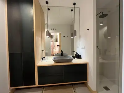 a bathroom with a sink and a mirror at Atico Torre Tavira Ascensor Grupo AC Gestion in Cádiz