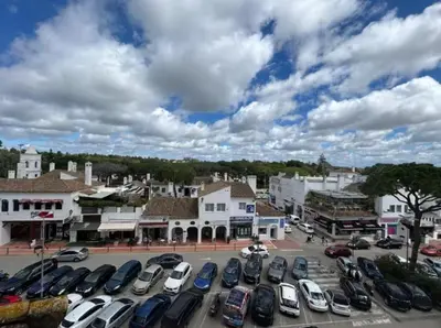 a group of cars parked in a parking lot at Apartoyou - Vistahermosa Lux in El Puerto de Santa María