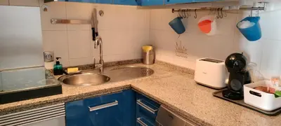a kitchen with a sink and a counter top at Apartamento Danubio in El Puerto de Santa María
