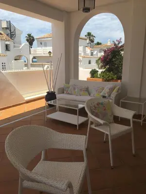 an open door with a view of the ocean at Casa en Sancti Petri junto a playa La Barrosa in Chiclana de la Frontera