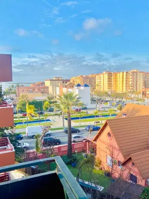 a view of a city with buildings and a street at ÁTICO Centro y Playa in Sanlúcar de Barrameda