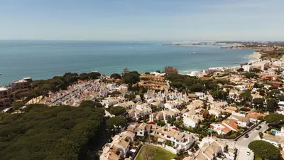 an aerial view of a town next to the ocean at Andalusian beach haven villa in El Puerto de Santa María