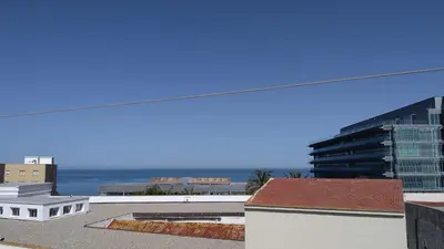 a view of the ocean from the roof of a building at Piso en la Caleta in Cádiz