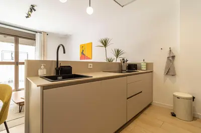 a kitchen with a sink and a counter top at Allo Apartments San Clemente Parking Piscina Centro 2 Habitaciones in Jerez de la Frontera