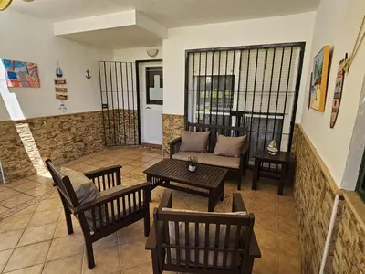 a bedroom with a bed with two pillows on it at VIÑAS DEL MAR-BALCONERA in Chiclana de la Frontera