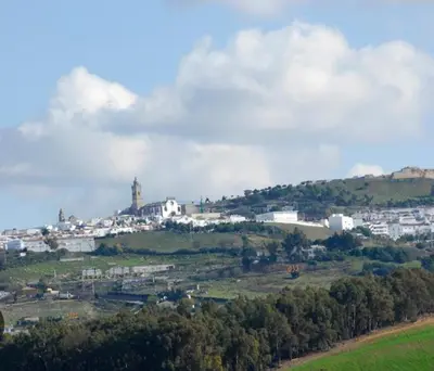 a city on top of a hill with a town at La Cuesta in Medina Sidonia