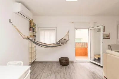 a room with a hammock hanging from the wall at La Isleña in San Fernando