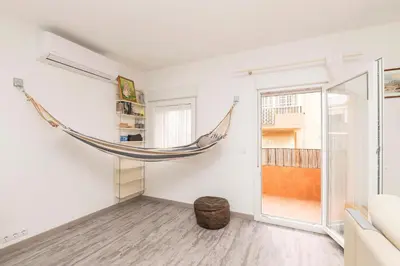 a room with a hammock hanging on the wall at La Isleña in San Fernando