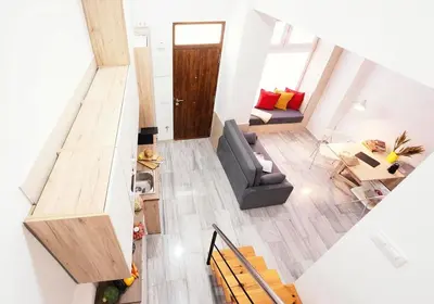 an overhead view of a living room and dining room at Summerlandrota Veracruz28 in Rota
