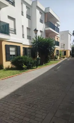 an empty street in front of a building at Apartamento Centro Estación, Parking Privado in El Puerto de Santa María