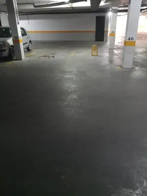 a parking lot with a car parked in it at Apartamento Centro Estación, Parking Privado in El Puerto de Santa María