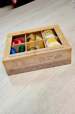 a wooden box filled with differentiatesiatesiatesiatesiatesktop at Casa Plaza Alta in Alcalá de los Gazules