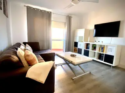 a living room with a couch and a coffee table at MyChoice San Francisco in Rota