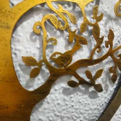 a close up of a metal heart with snow on it at Apartamento Playa Tanguillos del Mar in Cádiz